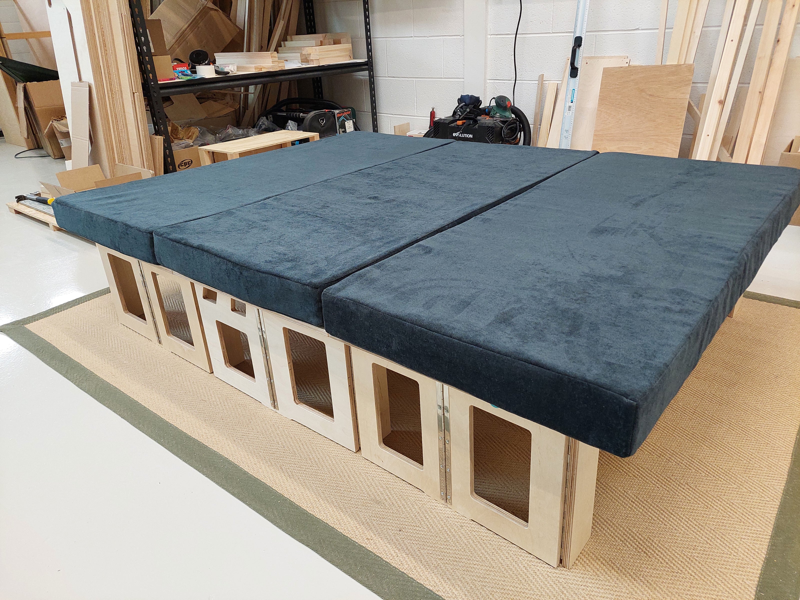 Van bed in sleep mode with cushions