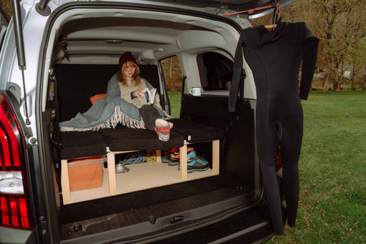 Micro camper conversion used as sofa