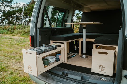 Premium Micro Camper Conversion installed in van boot with pull-out kitchen drawer and storage box