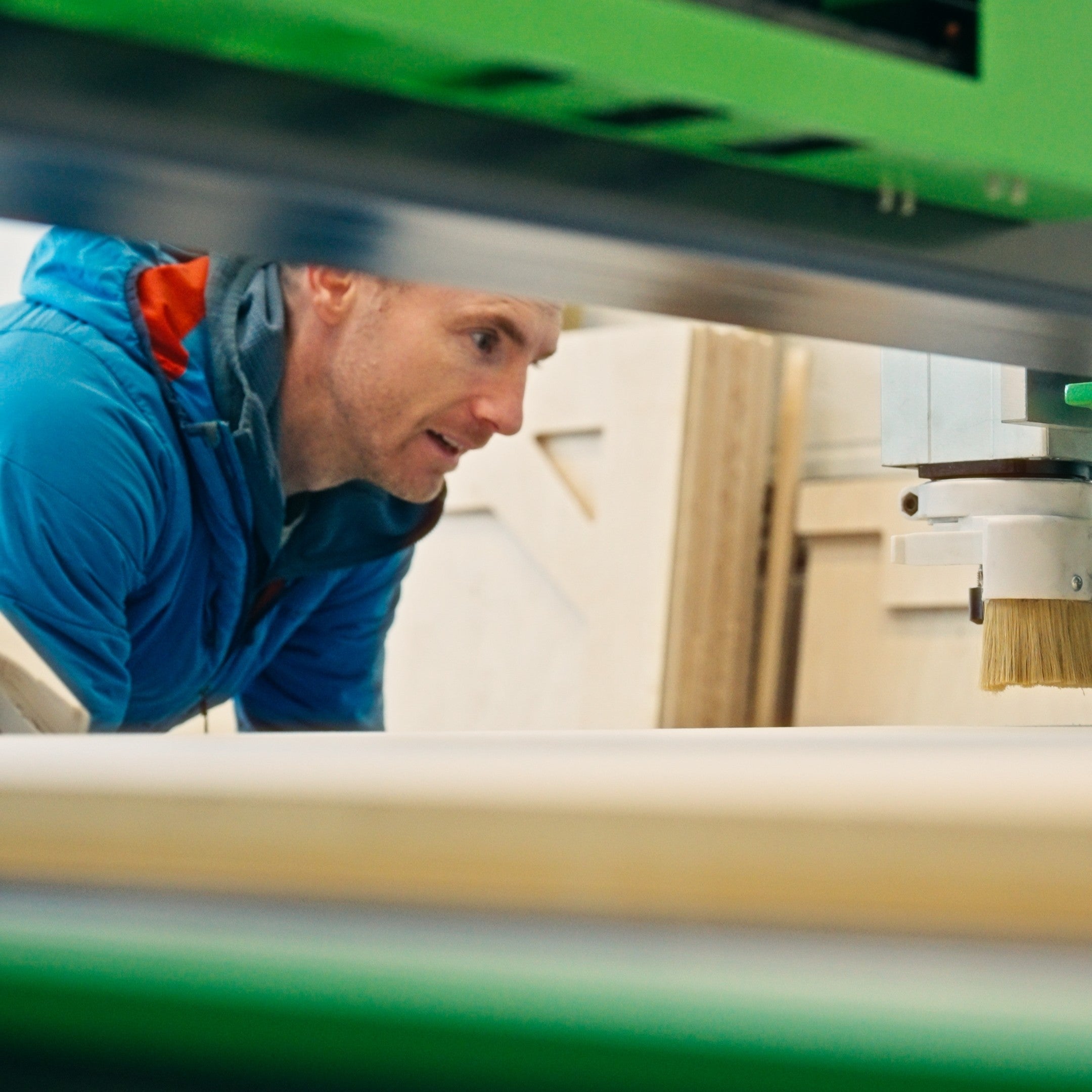 Person operating a CNC machine